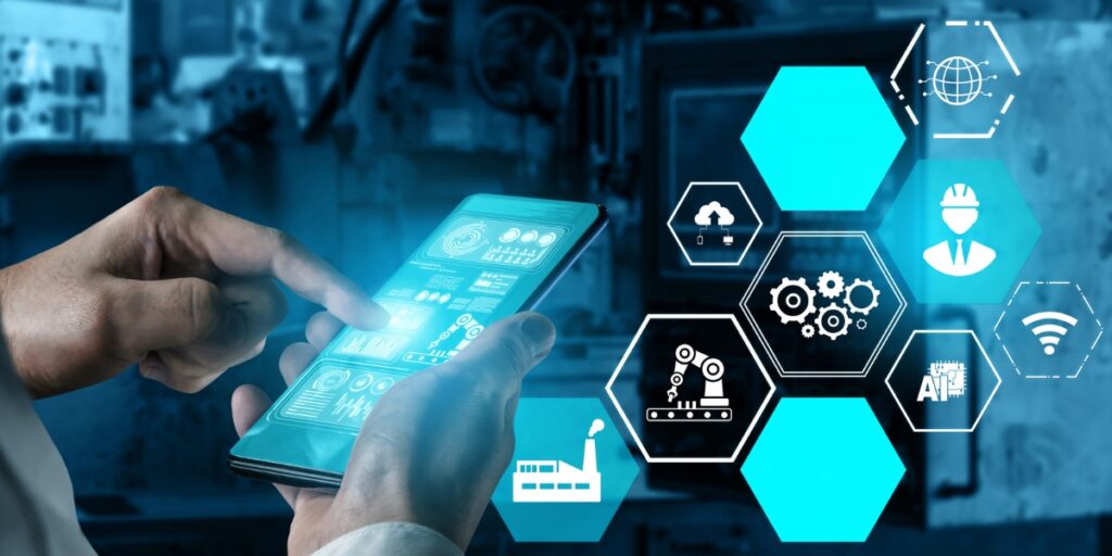 Integración de CMMS con la planta: panel móvil muestra KPIs de mantenimiento en tiempo real conectados a equipos industriales.